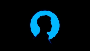 силуэт головы человека на фоне голубого круга 