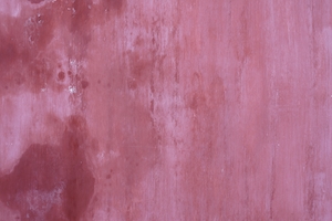 Узор, розовая текстура на старой стене
