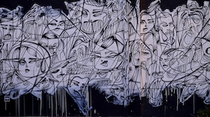 граффити из абстрактных линий, лица людей 
