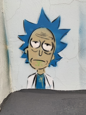граффити на бетонной стене, персонаж из мультфильма 